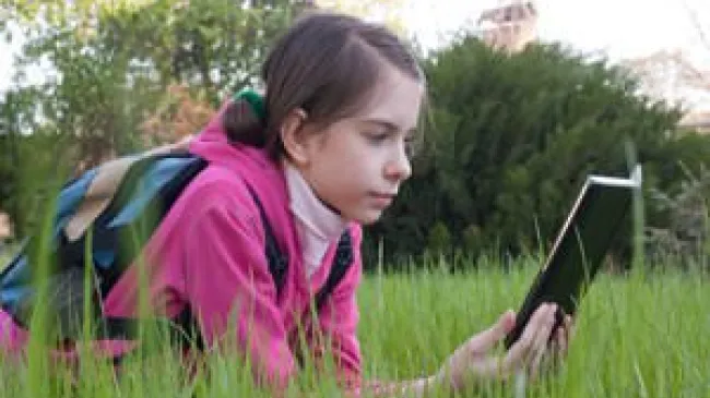 Daily Aug 9 child reading